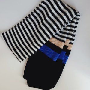 White, black, blue and tan scarf. Lightweight sweater.r material.